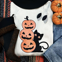 Black Cat and Pumpkins